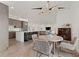 Modern dining area with a round table, woven chairs, and a stylish light fixture at 1494 Red Fox Ne Dr # D, Atlanta, GA 30306