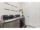 Bright laundry room with LG washer and dryer, and ample storage at 1494 Red Fox Ne Dr # D, Atlanta, GA 30306