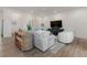Bright and airy living room with hardwood floors, comfortable seating, and large windows at 1494 Red Fox Ne Dr # D, Atlanta, GA 30306