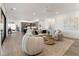 Spacious living room with hardwood floors, large sectional sofa, and stylish coffee table at 1494 Red Fox Ne Dr # D, Atlanta, GA 30306