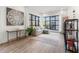 Cozy living area with hardwood floors, large windows, and a comfortable sectional sofa at 1494 Red Fox Ne Dr # D, Atlanta, GA 30306