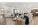 Spacious living area with hardwood floors, comfortable seating, and an open floor plan at 1494 Red Fox Ne Dr # D, Atlanta, GA 30306