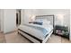Main bedroom with a king-size bed and en-suite bathroom access at 1494 Red Fox Ne Dr # D, Atlanta, GA 30306