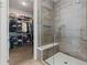 Large walk-in shower with built-in bench and glass enclosure at 1494 Red Fox Ne Dr # D, Atlanta, GA 30306