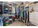 Spacious walk-in closet with ample shelving and hanging space at 1494 Red Fox Ne Dr # D, Atlanta, GA 30306