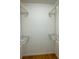 Large walk-in closet with double hanging rods and shelves at 3639 Holly Springs Rd, Rockmart, GA 30153