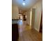 Hardwood floor hallway with views into kitchen and other rooms at 3639 Holly Springs Rd, Rockmart, GA 30153