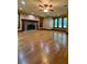 Living room with hardwood floors, fireplace, and ceiling fan at 3639 Holly Springs Rd, Rockmart, GA 30153