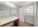 Bedroom with vanity and ample closet space at 620 Sheringham Ct, Roswell, GA 30076