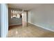 Living room with hardwood floors and a view into the kitchen at 620 Sheringham Ct, Roswell, GA 30076