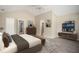 Spacious bedroom with a vaulted ceiling, a bed, and ensuite bathroom access at 646 Lakes Cir, Lithonia, GA 30058