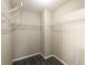 Large walk-in closet with wire shelving for storage at 646 Lakes Cir, Lithonia, GA 30058