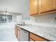 Kitchen with granite countertops and stainless steel dishwasher at 646 Lakes Cir, Lithonia, GA 30058