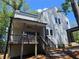 Large deck, perfect for entertaining, connected to the main house at 135 Cedarwood Ln, Roswell, GA 30075