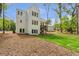 Spacious backyard showing lots of nature and mature trees at 135 Cedarwood Ln, Roswell, GA 30075