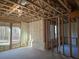 Unfinished basement with spray foam insulation and windows at 135 Cedarwood Ln, Roswell, GA 30075