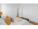 Bright bedroom features hardwood floors, and access to the stairwell at 135 Cedarwood Ln, Roswell, GA 30075