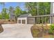 Long driveway leading to the home and detached three car garage at 135 Cedarwood Ln, Roswell, GA 30075