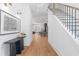 Bright and airy entryway features hardwood floors and stylish decor at 135 Cedarwood Ln, Roswell, GA 30075