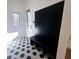 Modern entryway with built-in bench and hexagon tile flooring at 135 Cedarwood Ln, Roswell, GA 30075