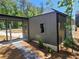 Garage with a covered walkway that leads to the main house at 135 Cedarwood Ln, Roswell, GA 30075