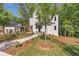 Beautiful two-story home boasting a modern design and meticulously landscaped grounds at 135 Cedarwood Ln, Roswell, GA 30075