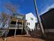 Two-story home with deck and attached garage at 135 Cedarwood Ln, Roswell, GA 30075