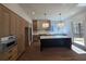 Spacious kitchen featuring hardwood floors and large island at 135 Cedarwood Ln, Roswell, GA 30075