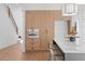 Bright kitchen featuring custom wood cabinets, stainless steel appliances, and an island with marble countertop at 135 Cedarwood Ln, Roswell, GA 30075