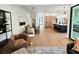 Open concept living space boasts a seamless flow, connecting the kitchen, dining, and living areas at 135 Cedarwood Ln, Roswell, GA 30075
