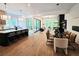 Bright, open-concept living space with a kitchen, dining, and seating area, perfect for entertaining at 135 Cedarwood Ln, Roswell, GA 30075