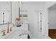 Bright main bathroom featuring double vanity, modern finishes, and natural light at 135 Cedarwood Ln, Roswell, GA 30075