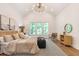 Main bedroom showcases high ceilings and three large windows providing ample natural light at 135 Cedarwood Ln, Roswell, GA 30075
