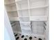 Well-organized pantry with ample shelving and pull-out drawers at 135 Cedarwood Ln, Roswell, GA 30075