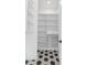 Walk in pantry has tile floors and custom shelving at 135 Cedarwood Ln, Roswell, GA 30075