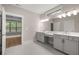 Bathroom with double vanity and view of bedroom at 320 Sobeck Way, Canton, GA 30115