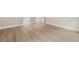 Light hardwood flooring in a spacious bedroom at 320 Sobeck Way, Canton, GA 30115