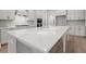 Large kitchen island with white quartz countertop at 320 Sobeck Way, Canton, GA 30115