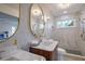 Spa-like bathroom with a large walk-in shower and marble vanity at 4485 Coventry Ne Way, Roswell, GA 30075