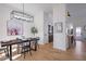 Bright dining room with hardwood floors and a rustic farmhouse table at 4485 Coventry Ne Way, Roswell, GA 30075