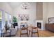 Bright and airy living room with a modern fireplace and hardwood floors at 4485 Coventry Ne Way, Roswell, GA 30075