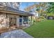 Brick patio with French doors leading to a screened porch at 1393 Lanier Ne Pl, Atlanta, GA 30306