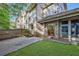 Landscaped backyard with patio and screened porch at 1393 Lanier Pl, Atlanta, GA 30306