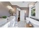 Spa-like bathroom with double vanity and a freestanding tub at 1393 Lanier Pl, Atlanta, GA 30306