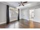 Charming bedroom with hardwood floors, ceiling fan and en-suite bathroom at 1393 Lanier Ne Pl, Atlanta, GA 30306