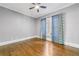 Well-lit bedroom with hardwood floors and ceiling fan at 1393 Lanier Pl, Atlanta, GA 30306