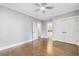 Bedroom with hardwood floors, ceiling fan and en-suite bathroom at 1393 Lanier Ne Pl, Atlanta, GA 30306