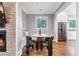 Cozy breakfast nook with built-in bench seating and round table at 1393 Lanier Ne Pl, Atlanta, GA 30306