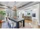 Bright dining room with dark wood table and chandelier at 1393 Lanier Ne Pl, Atlanta, GA 30306