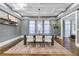 Elegant dining room with dark wood table and chandelier at 1393 Lanier Ne Pl, Atlanta, GA 30306